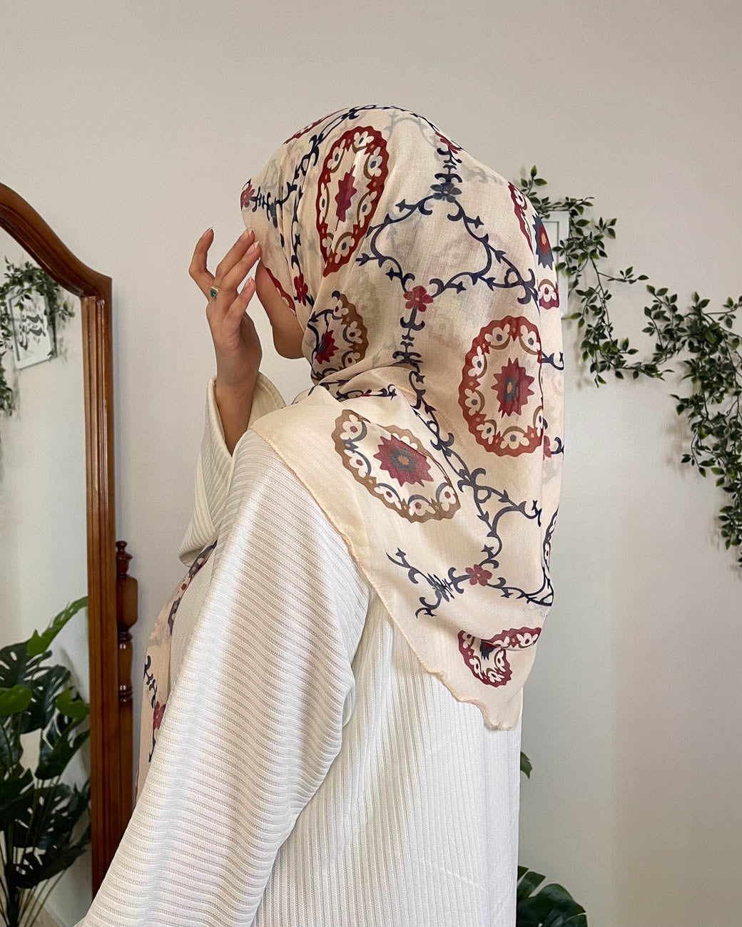 Back view view highlighting the full coverage and luxurious feel of the Andalusia collection headwrap, perfect for formal occasions.