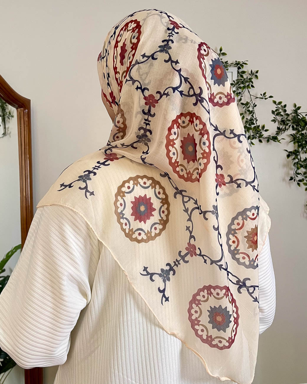 Detailed back view displaying the beautiful, symmetric distribution of the full arabesque pattern on the Andalusia collection gauze hijab.
