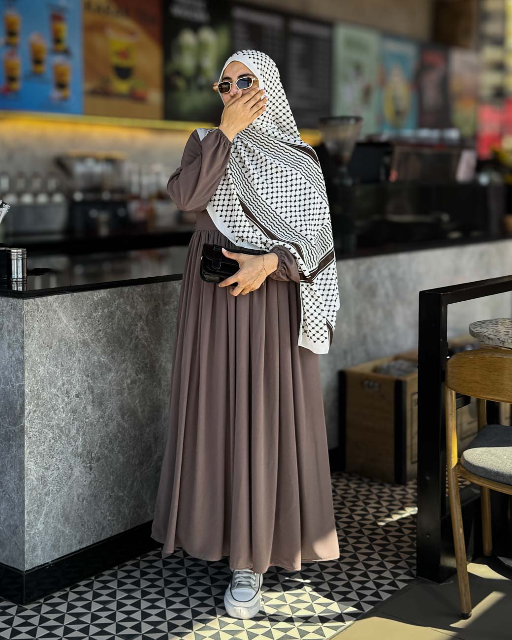   Front view of Hadiyah Palestine Premium White Chiffon Scarf with intricate burnt brown kufiya patterns.